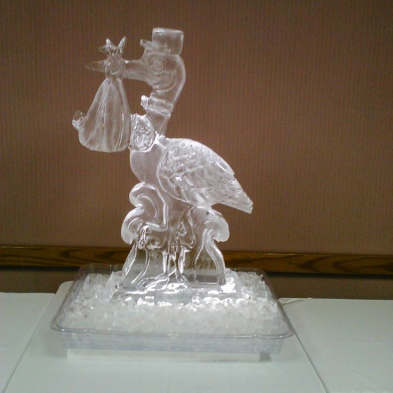 http://ice-sculptures.net/wp-content/uploads/2015/07/a-stork-carrying-a-baby-for-baby-showers-570x570.jpg